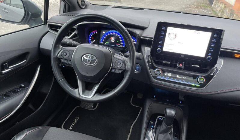 TOYOTA COROLLA Touring Sports 2.0 Hybrid Comfort Style Tech e-CVT PANORÁMATETŐ/JBL/Bi-LED/HEAD UP/KULCSNÉLKÜLI/ÜLÉSFŰTÉS/HOLTTÉRFIGYELŐ full